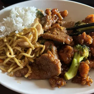 (right to left) Steamed White Rice, Chicken Lo Mein, Beef Broccoli, and Orange Chicken