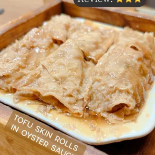 a plate of crepes in oyster sauce