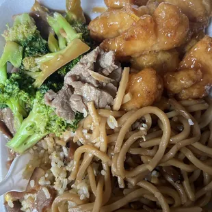 a take out container of chinese food