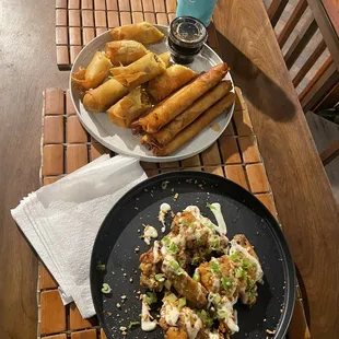 Lemon pepper wings, tradition lumpia, and vegan curry lumpia