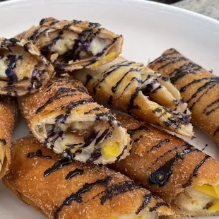 Turon: Saba banana, brown sugar, cinnamon sugar dust with ube drizzle. It was goooood!