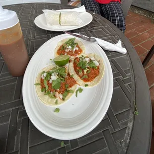 Beef burrito top  Chorizo tacos bottom