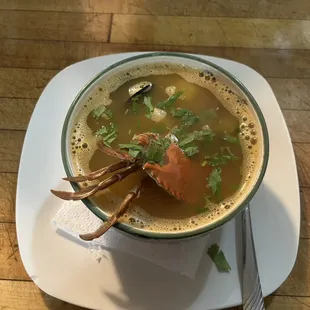 Siete mares soup (seafood soup)  carrots, celery and potatoes side of rice and tortillas
