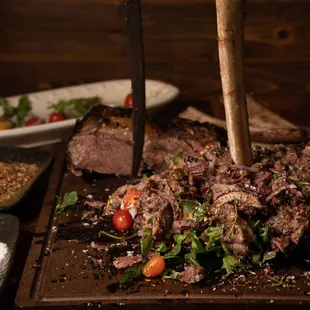 a steak on a cutting board