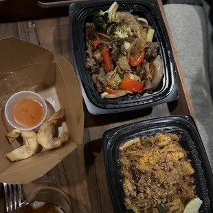 Drunken noodles with beef and pad Thai with pork, fried crab wontons