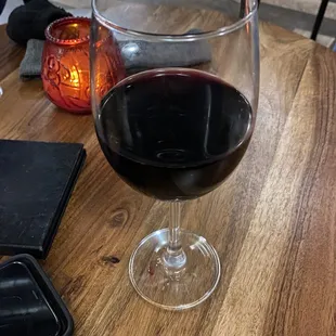  glass of wine on a table