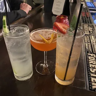 hree cocktails on a bar