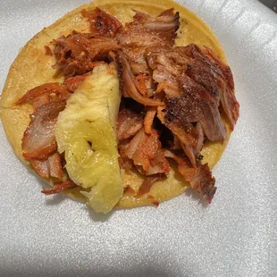 a pork and pineapple taco