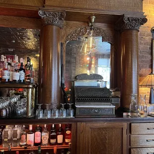 Love the old cash register and shotgun...