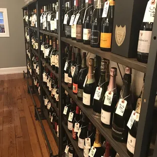 wine bottles on shelves