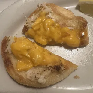 Half of my $19.99 crab melt, served lukewarm. I did get a side salad, but no veggie and no potato. I had to pay for a side potato.