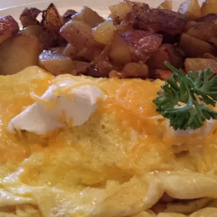 Their Philly omelet is full of sautéed  mushrooms and cream cheese! Yummy!