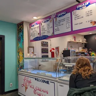 a woman sitting at a counter