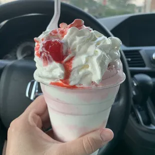 Cotton Candy sundae with marshmallow syrup, whipped cream and a cherry