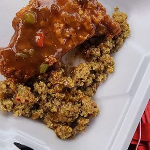 a close up of a meal in a styrofoam container