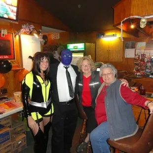 a group of people in a bar