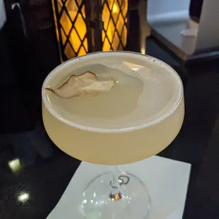 a cocktail in a coupe glass