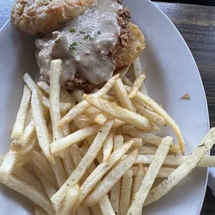 Brunch special - chicken, jalapeño biscuit and gravy...DEEEELISH!