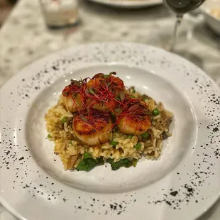 Seared scallops over vegan risotto. GF/DF