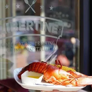 lobster and corn on a plate