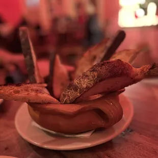 bacon in a bowl on a plate