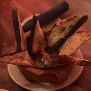 a plate of french fries and a plate of salad