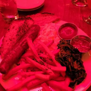 Breakfast for dinner! This is scrambled eggs, pork sausage, fries, and a side of sautéed spinach.