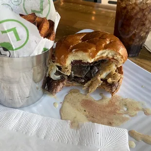 Uber juicy and flavorful Bella Baby burger with bacon.. look at that juice... perfectly cooked medium