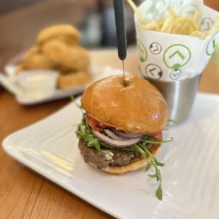 a hamburger with a toothpick sticking out of it