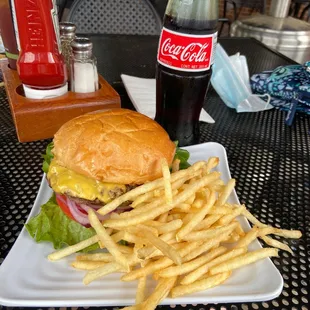 Nice burger.....this is just a kid&apos;s cheeseburger with bacon! Lovin these skinny crispy fries!!