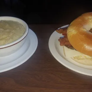 Buttered gris qnd bacon, sausage, egg, and cheese bagel