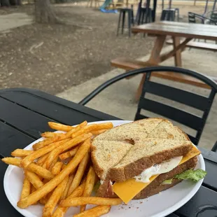 Club sandwich with fries