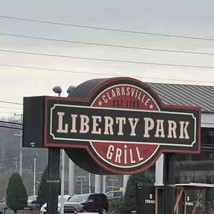 the sign for liberty park grill