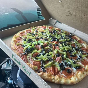 Ordered a large pepperoni with black olives and green bell peppers