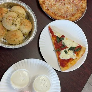 Small cheese pizza, garlic knotts, slice of margarita pizza