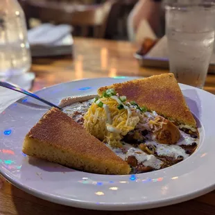 Vegetarian chili with grits and cornbread