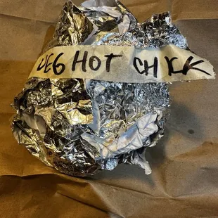 a wrapper wrapped in aluminum foil