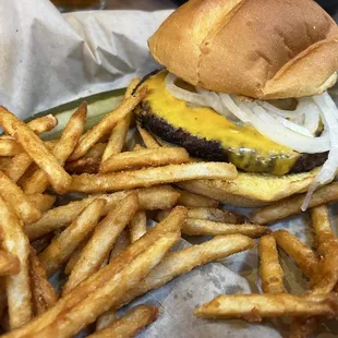 Cheeseburger with Onions!  Crispy fries on the side