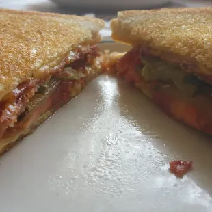 a sandwich cut in half on a plate