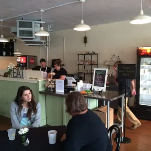 Cozy seating options and ordering counter.