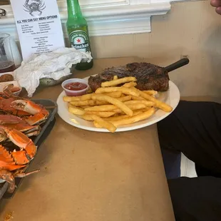 Ribeye steak and fries
