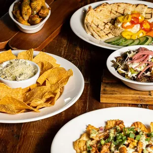 plates of food on a wooden table