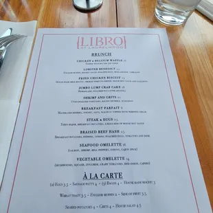 a menu on a wooden table