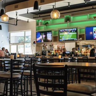 people sitting at the bar