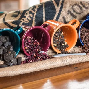 Loose teas; dark rose, red berries, gold blend, and Ethiopian coffee beans
