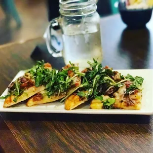 Flatbread - Pear, bacon, cheese, arugula and balsamic dressing.  It was so good.