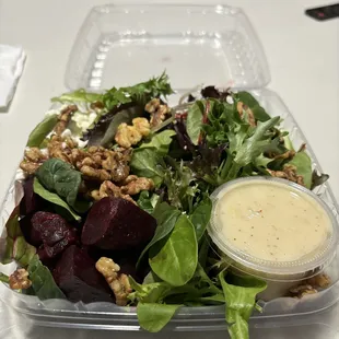 Roasted beet salad - mixed greens, crumbled goat cheese, roasted beets, candied walnuts with a lemon vinaigrette.