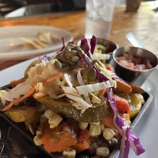 The Verduras Tacos -- roasted sweet potato, mushrooms, corn, squash, cabbage, and pepitas
