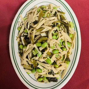 a plate of pasta and peas
