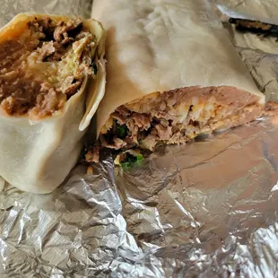 Super Steak Burrito,  w/ refried beans and green sauce